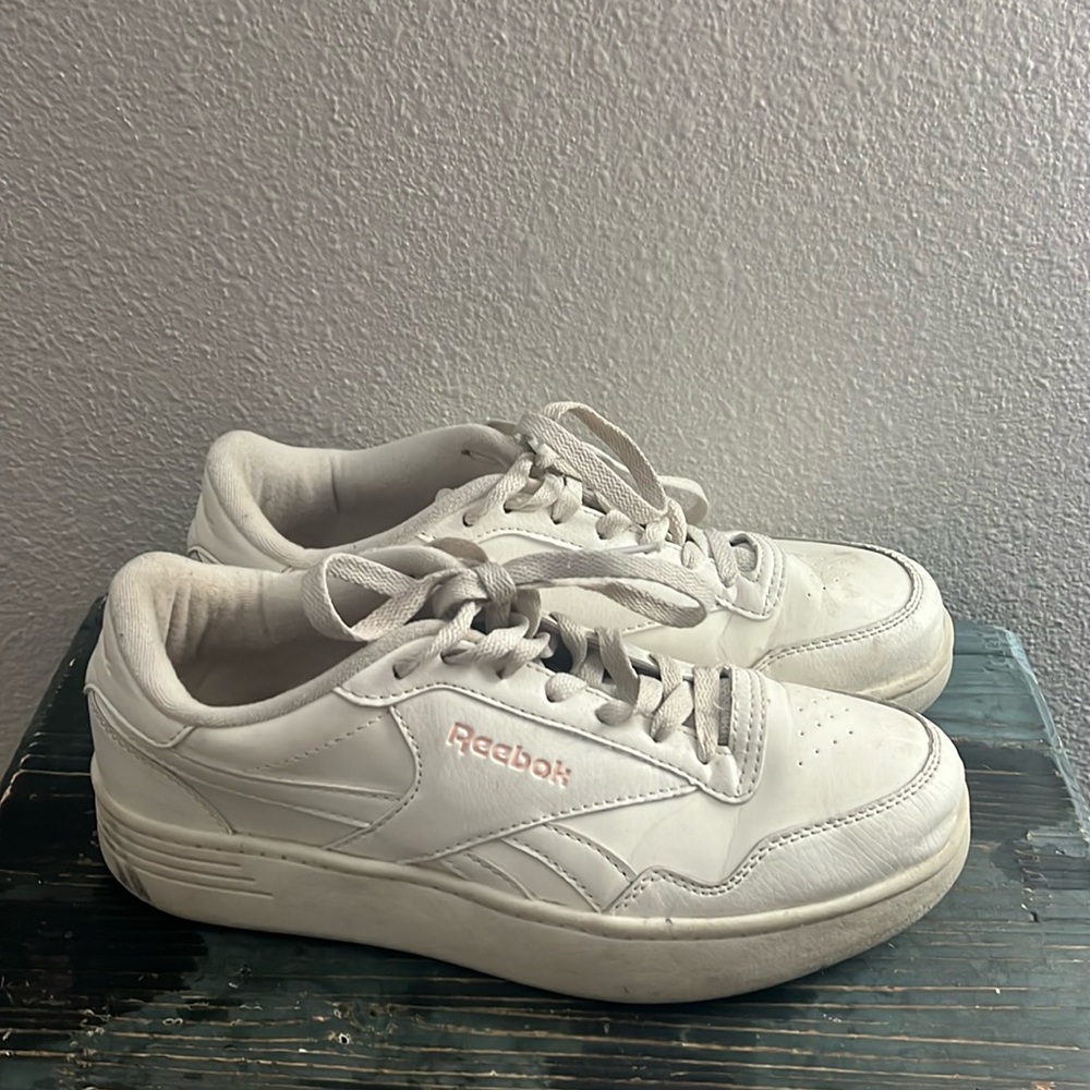 White and pink reeboks